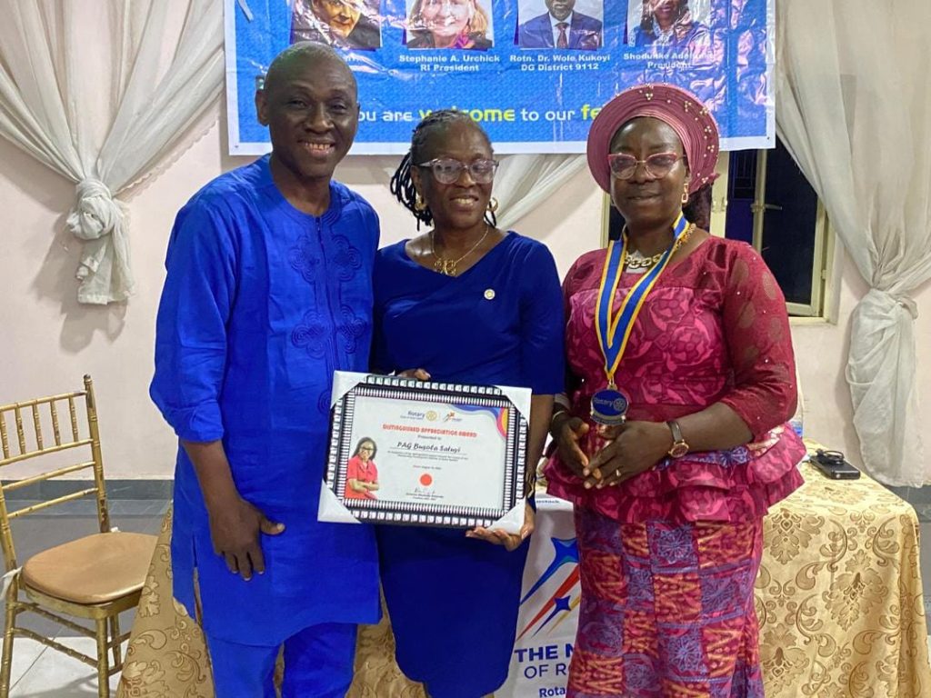 Presentation of Award to our Guest Speaker PAG Busola Satuyi