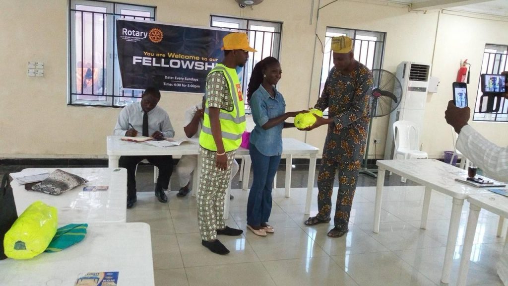 PP Adegoke Adeoye decorating Aspiring Rot. Kunle Adeshina as the club’s Polio Ambassador for the Rotary year 2018-2019.