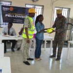 PP Adegoke Adeoye decorating Aspiring Rot. Kunle Adeshina as the club’s Polio Ambassador for the Rotary year 2018-2019.